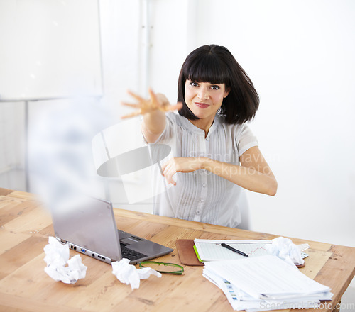 Image of Upset, throwing paper and portrait of business woman at her desk with burnout, anger or stress. Frustrated female worker with finance documents or angry about accounting problem or crisis at laptop