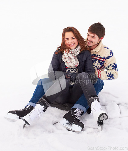 Image of Couple in the snow, ice skating outdoor with happiness and spending quality time together, relax in winter weather. Happy people cuddling, skate on frozen lake and bond in nature with love and care