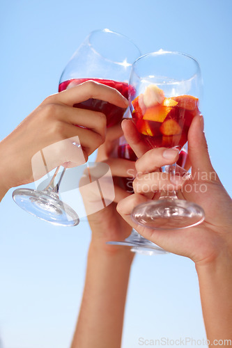 Image of Hands, cocktail toast and friends outdoor for celebration of friendship together. Alcohol, glass and group cheers to celebrate at summer party, event or social gathering for drinking in low angle.