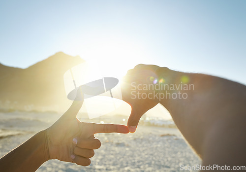 Image of Pov, hands and frame with sunshine, beach and wellness with sky, getaway and memory of ocean getaway. Closeup, hand and person with sunlight, seaside holiday and summer vacation on a tropical island