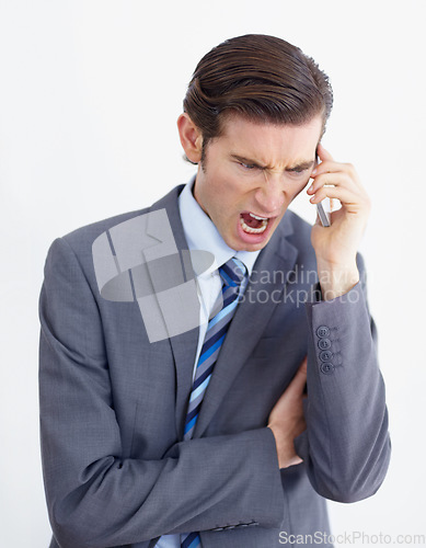 Image of Phone call, fail and business man angry, annoyed and screaming in studio on white background. Stress, anger and male person annoyed with phishing, delay and conversation with bad connection problem