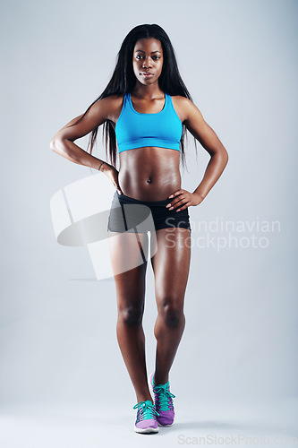 Image of African woman, studio portrait and fitness for body, exercise and healthy lifestyle by background. Girl, model and workout fashion for confidence, focus and start training for wellness by backdrop