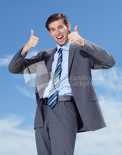 Image of Thumbs up, business man and portrait with blue sky and happiness from work promotion. Target goal, happy and face with success hand sign for businessman in thank you, yes and achievement agreement