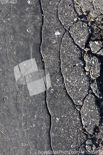 Image of old damaged asphalt