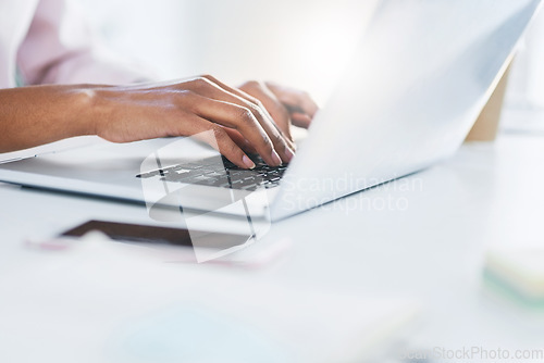 Image of Laptop, typing and hands of business woman in office working on proposal, online document and project. Corporate, computer and closeup of worker on keyboard for writing email, internet and research