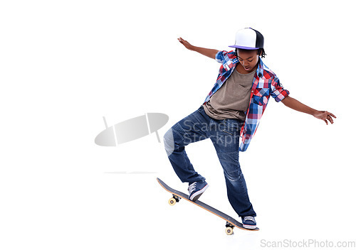 Image of Skateboard, black boy and kid in a studio with mockup and jump trick with young style. Isolated, white background and African male child with a skateboarding and skater with energy and skill