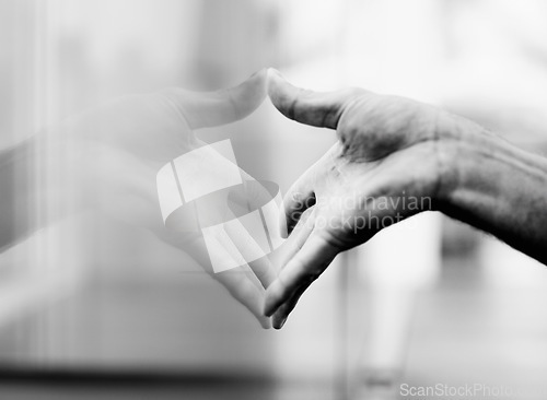 Image of Closeup, window and hand with a reflection, glass and grey with monochrome and aesthetic. Zoom, person and model with light, design or fingers with art, interior and press with creativity or artistic