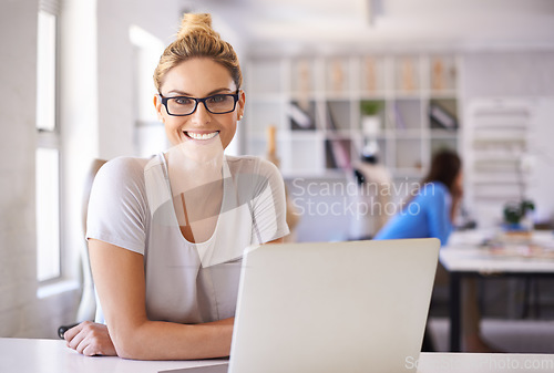 Image of Smile, laptop and fashion designer with portrait of woman for creative, planning and retail. Boutique, small business and internet with female employee in workshop for store, industry and tailor