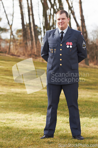 Image of Portrait, Denmark and veteran general or official in uniform or flag on sleeve and male soldier outdoors. Danish military, hero and badge of honor or man officer or security and courage for war