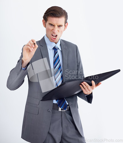 Image of Portrait, HR and angry man with documents pointing in studio for compliance, complaint or discipline on white background. Face, boss and businessman with paperwork for accountability in the workplace