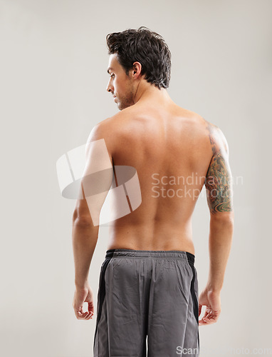 Image of Back, results and a man for fitness and health isolated on a white background in a studio. Exercise, model and a person with progress from sports, workout and healthy lifestyle on a backdrop