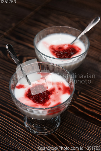 Image of Raspberry yougurt on wooden