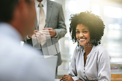 Image of Portrait, business and smile of black woman in meeting in office with employees. Professional, corporate and happiness of African female leader coworking, confidence and planning in company workplace