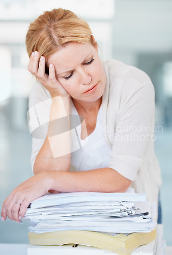 Image of Stress, pile of paperwork and business woman overworked, exhausted and tired in office. Burnout, stack of documents and female person with depression, fatigue and overwhelmed with anxiety at work.