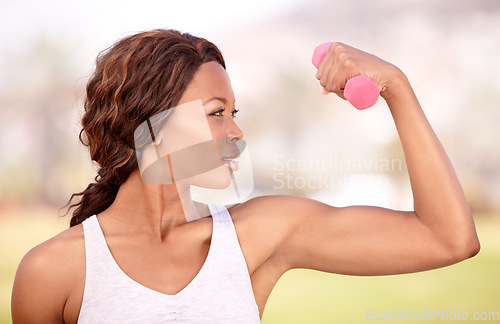 Image of Weightlifting, fitness and black woman flex in park for exercise, body builder training and workout. Sports, strength and female athlete with muscles for wellness, healthy lifestyle and confidence