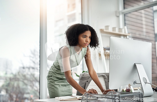 Image of Busy, typing and woman on computer for office online management, planning or productivity in hr career. Human Resources worker or african person working on desktop pc and keyboard for business or job