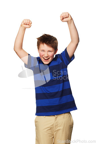 Image of Portrait, celebration and excited kid with hands raised in studio isolated on a white background. Boy, winner and happy child celebrate achievement, success or winning, happiness and victory.