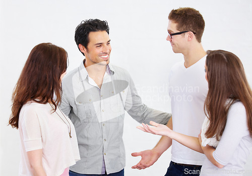 Image of Business, group and staff brainstorming, collaboration and discussion with people isolated against white studio background. Employees, men and women share ideas, planning or partnership with teamwork