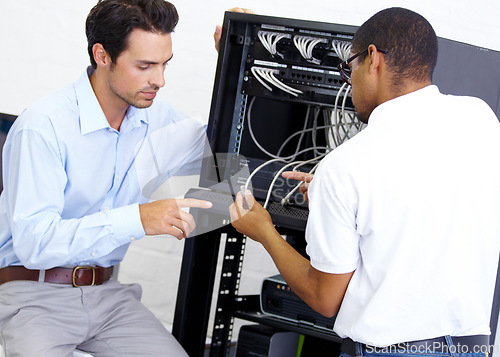 Image of Cables, programming and men with server. talking and cyber security in the workplace. Male employees, coworkers and staff with coding, electrician and technician with communication and tech support