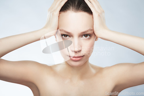 Image of Skincare, face portrait and a woman with beauty from treatment isolated on a white background in studio. Serious, young and a female model for dermatology and cosmetics on a backdrop for care of skin