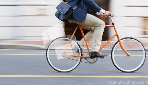 Image of Bicycle, travel and legs of business man in a road riding to work or appointment in n a street. Carbon footprint, cycling and shoes of male on bike traveling in a city on eco friendly transportation