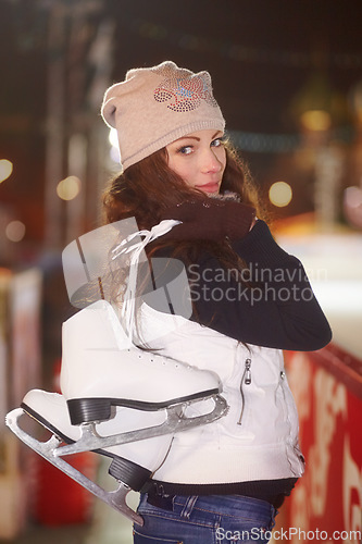 Image of Portrait, smile and woman with ice skate, winter and happiness with fitness, training and sports. Face, female person and girl with fun shoes for skating rink, practice and playful with joy and relax