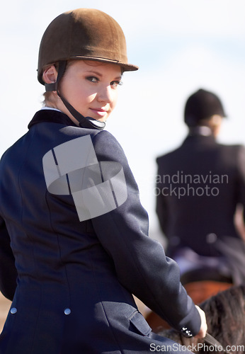 Image of Equestrian, rider and portrait of woman on horse for competition, training and show. Performance, riding and fitness with female jockey on stallion for animal, athlete and contest event