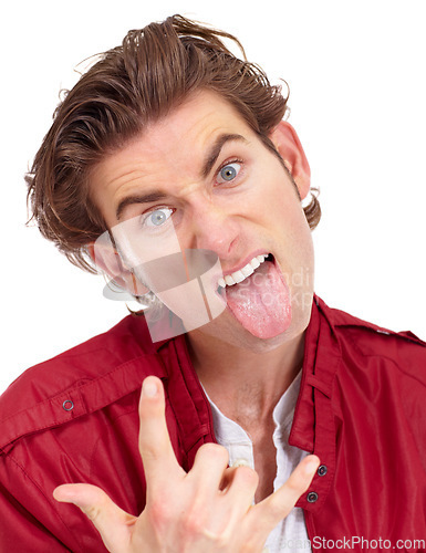 Image of Man in portrait with tongue out, rock hand gesture and facial expression isolated on white background. Punk, rocker and emoji with crazy face in studio, male model with energy and devil horn symbol