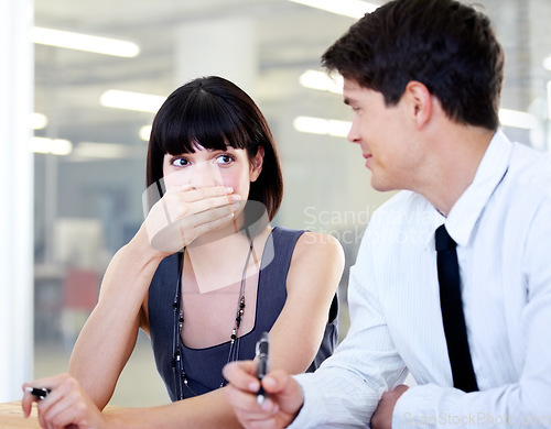 Image of Business people, teamwork and laughing in office while working together on project. Collaboration, funny and man and woman, employees or friends laugh at comedy, joke or humor in corporate workplace.