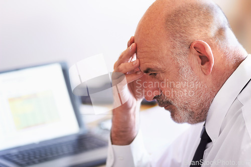 Image of Mature, business man and stress in a office from computer market crash and investment loss. Ceo, anxiety and burnout with headache from thinking and laptop problem from trading and stocks fail