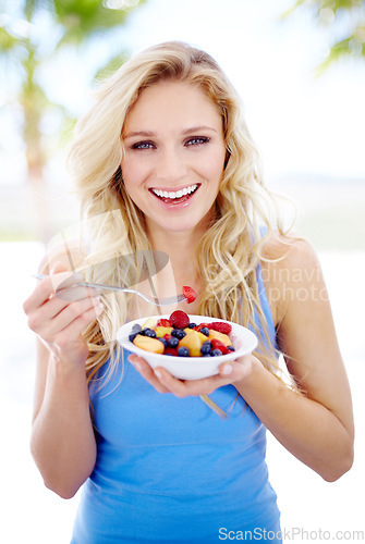 Image of Woman, portrait smile and fruit bowl for healthy eating, nutrition or fiber in dieting outdoors. Happy female person smiling in happiness for breakfast diet, organic meal or natural food in nature