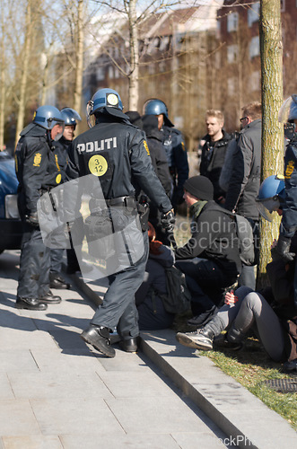 Image of Police men, strike and security in the city of Norway for street safety, service or law enforcement. Group of government politi officers doing their job in a urban town for crime, justice or riot