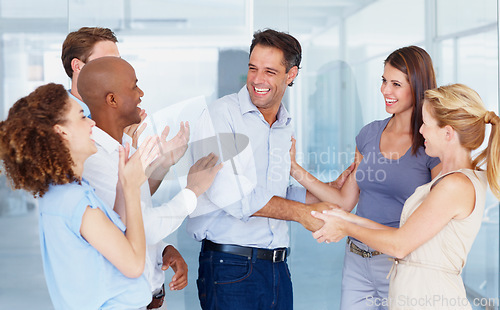 Image of Business people, clapping or handshake in office for promotion. Team celebrating or cheering, congratulations or support and diversity coworkers happy for success of worker, employee or colleague.