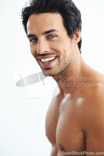 Image of Portrait, skincare and man with dermatology, smile and grooming routine against a white studio background. Face, male person or happy model with happiness, salon treatment and luxury with muscle