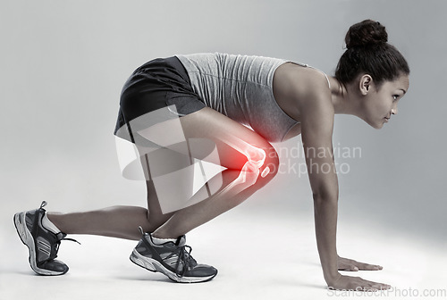 Image of Woman, running and start with knee x ray for injury, workout or sport accident against a gray studio background. Female runner in skeleton pain with sore leg, ache or bone from exercising or training