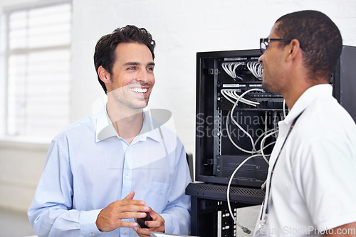 Image of Server room, it support and maintenance with a technician talking to a business man about cyber security. Network, database and consulting with an engineer chatting about information technology