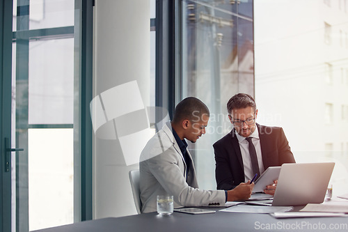 Image of Tablet, laptop and business men planning in conference room meeting, teamwork and discussion of corporate data. Professional people or partner talking, review or report analysis on digital technology