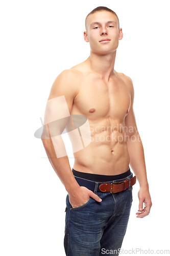 Image of Muscle, portrait and man with beauty, sexy and confident guy isolated against a white studio background. Face, male person and model with abs, abdomen and tors with bodybuilder, wellness and health