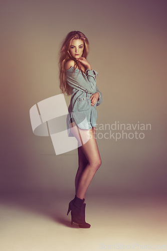 Image of Woman, casual fashion and portrait with body confidence and youth in a studio. Isolated, ginger hair and young female model alone with beauty and hipster style with attitude and gen z clothes