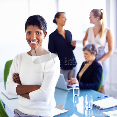 Image of Portrait, business and Indian woman with arms crossed, smile and meeting with startup. Face, female person and happy employee with leadership skills, planning and manager with confidence and teamwork