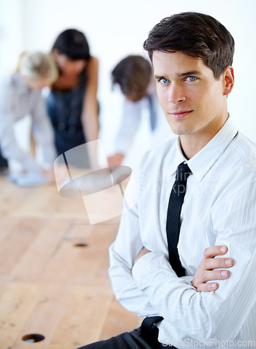 Image of Portrait, serious and business man with arms crossed in office with pride for career or job. Professional, confidence and male entrepreneur, executive or manager with success mindset in workplace.