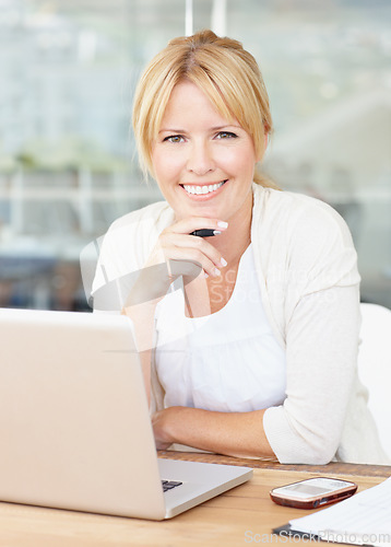 Image of Portrait, smile and business woman with laptop in office, workplace or company. Computer, happiness and female professional, entrepreneur or person from Australia with confidence and pride in career.