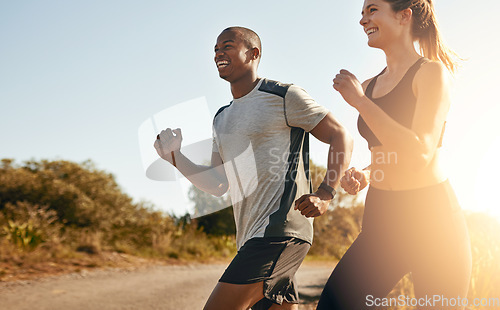 Image of Smile, running and health with couple in road for workout, cardio performance and summer. Marathon, exercise and teamwork with black man and woman runner in nature for sports, training and race