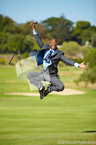 Image of Man, golf and jump for celebration, excited face or portrait for winning, achievement or goal outdoor. African businessman, golfer and corporate winner at sport pitch with suit, freedom or fitness