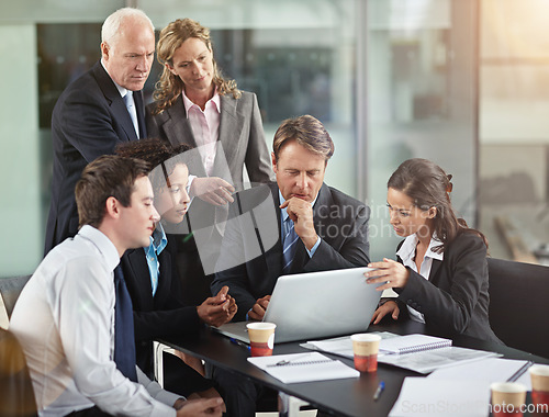 Image of Business, staff and group in a meeting, laptop and planning with collaboration, partnership and development. Coworkers, employees and men with women, share ideas and technology with focus and startup