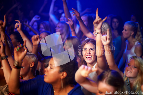 Image of Party, music concert and crowd dancing, happiness and cheerful with joy, fun and night club. Portrait, group or people with a smile, friends or bonding with celebration, social gathering and festival