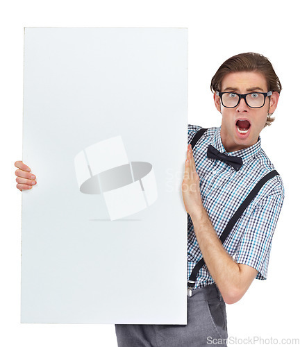 Image of Portrait, wow and mockup poster with a man in studio isolated on a white background for advertising. Surprise, announcement and space with a shocked or funny male nerd holding a placard for branding