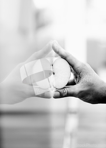 Image of Hands, apple and reflection in monochrome on glass with a person holding fruit closeup for health, diet or nutrition. Food, creative and art with a healthy snack in the hand of an adult in grayscale