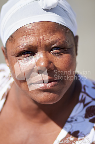 Image of Black woman, senior and skin portrait outdoor feeling relax and calm in the sun. Summer, real and African female person face with mature beauty closeup and natural wrinkles in retirement and sunshine