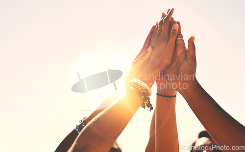 Image of Hands, high five and and group of people outdoors for solidarity, trust and goal collaboration. People, commitment and friends with hand in support of success, celebration and partnership or unity